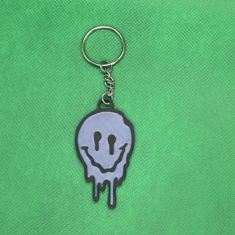 Blue Melting Smiley Face Keyring Keychain